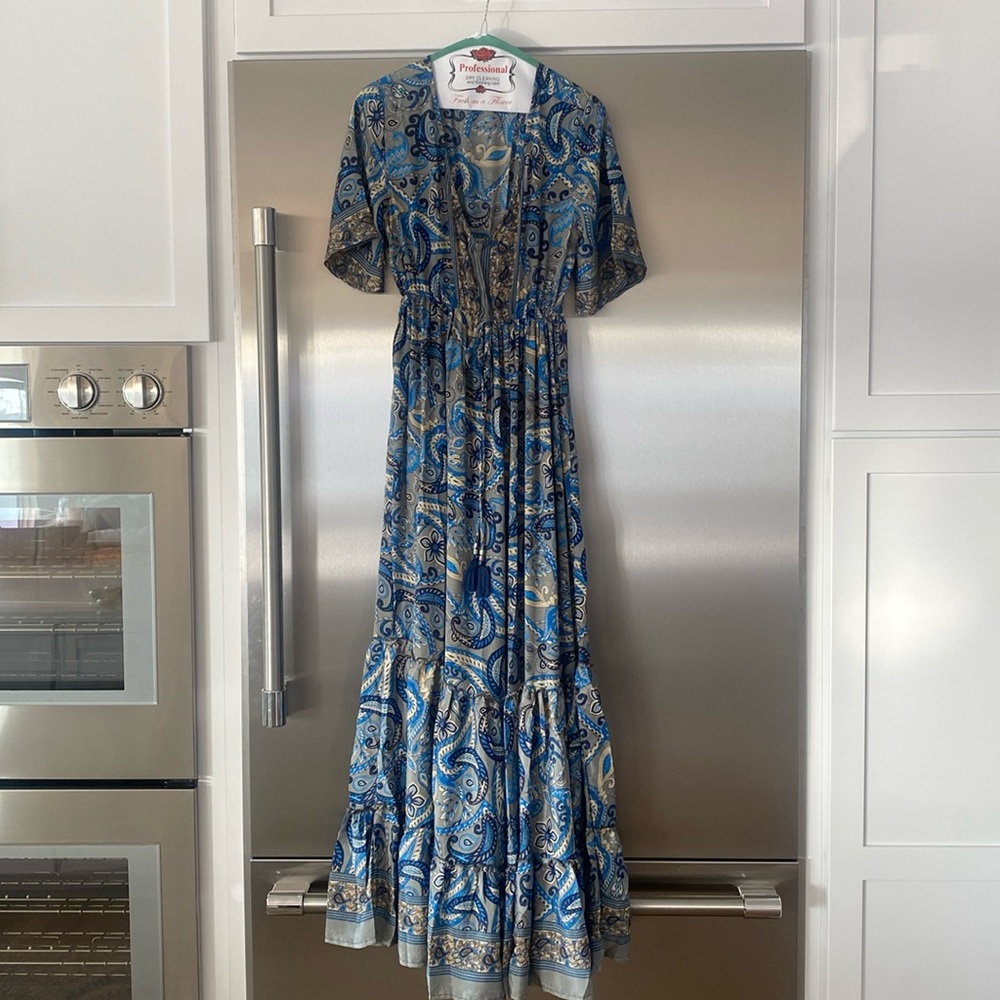 NWT beautiful dress. This dress can be used as a beach coverup or everyday dress
